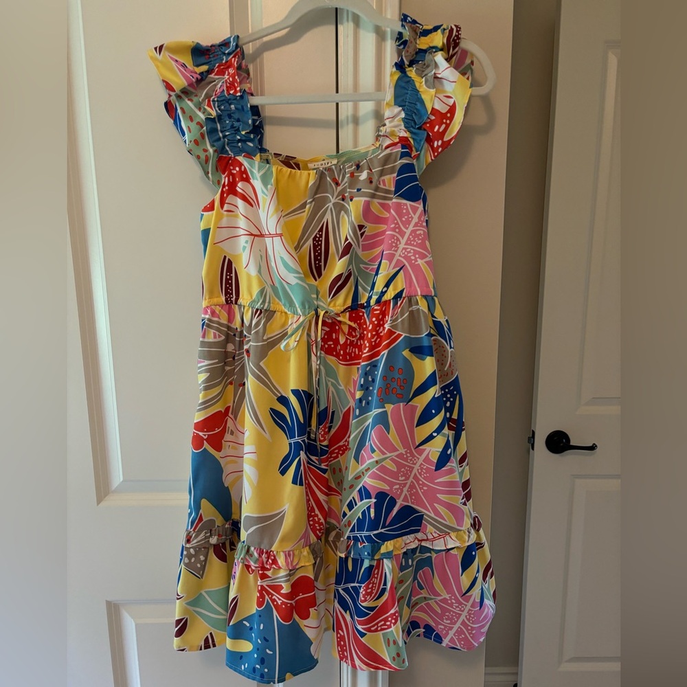 Boutique purchased Yellow mini dress.